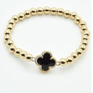 Gold Beaded Bracelet with Black Clover Charm